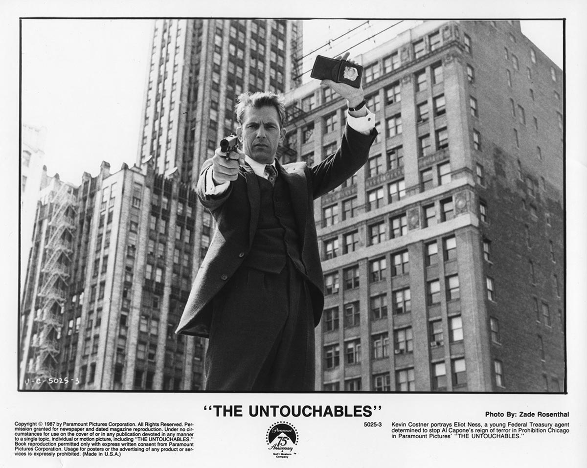 Press still. Кевин Костнер Неприкасаемые. The Untouchables 1987. Untouchables poster.